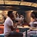 Two Guests entering the submarine themed Periscope Pub on the Disney Treasure